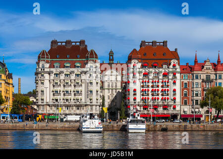 STOCKHOLM - SEPTEMBER, 15, 2016: Daytrip cruise boats along small harbor in center of Stockholm Stock Photo