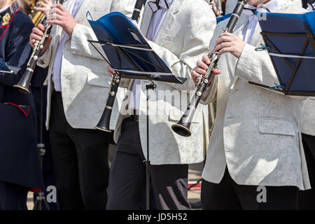 orchestra musicians playing clarinets during city music festival Stock Photo