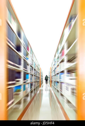 Library shelves, a large number of books. Stock Photo