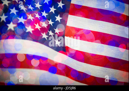 American flag background with double exposure of celebratory bokeh light bubbles like fireworks. Multiple exposure