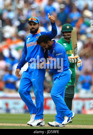 India's Virat Kohli celebrates after Pakistan's Babar Azam gets out during the ICC Champions Trophy final at The Oval, London. Stock Photo