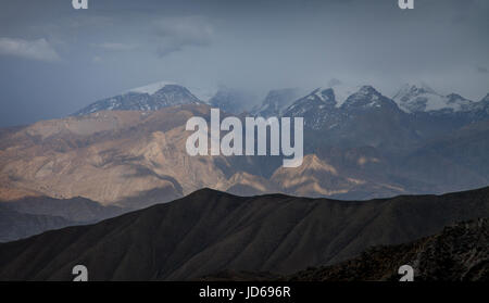 Storm over mountains in Upper Mustang, Nepal. Stock Photo