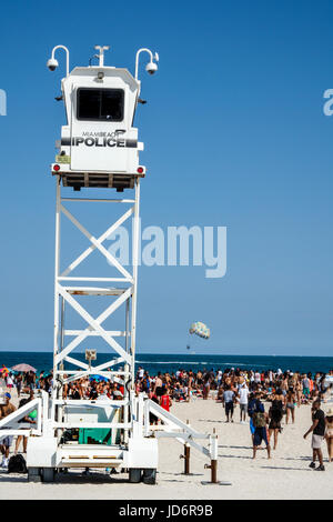 Miami Beach Florida,Atlantic Ocean,Spring Break,sand,police,observation tower,manned mobile surveillance system,Black man men male,woman female women, Stock Photo