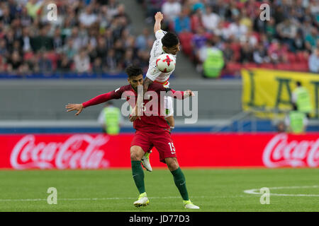 Kazan, Russia. 18th June, 2017. Portugal's Andre Gomes (bottom) vies with Mexico's Carlos Salcedo during the 2017 Confederations Cup Group A football match in Kazan, Russia, on June 18, 2017. Credit: Bai Xueqi/Xinhua/Alamy Live News Stock Photo