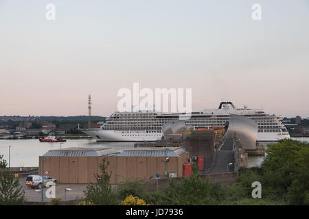 Thames Barrier , River thames, London, UK. 18th June 2017. The Viking star cruise ships passing through the Thames Barrier at the start of its 27 day itinerary to Stockholm. The 47,800-ton, 928-passenger cruise ship Viking Star was built in 2015 and was docked at Greenwich pier. The ship  relatively shallow 6m draft  (hull and superstructure)  which allows it to cruise in areas normally limited to small ships. Credit: WansfordPhoto/Alamy Live News Stock Photo