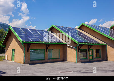 Solar panels on roof og new building, France Stock Photo