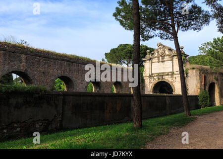 Fragment of Aurelian wall around Ancient Rome on Aurelia Antica street Stock Photo