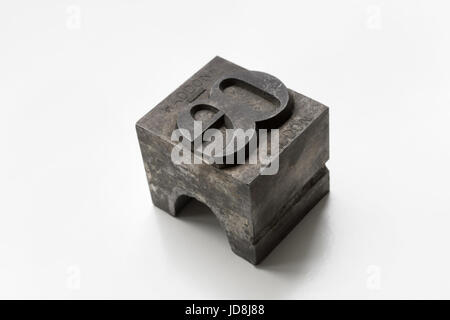 Old letterpress letter printing block isolated on a white background Stock Photo