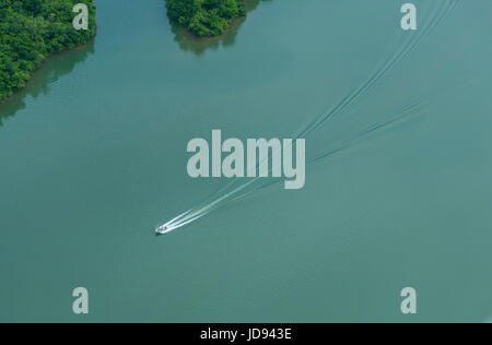 Aerial View Of Speedboat Speeding In Lake Stock Photo