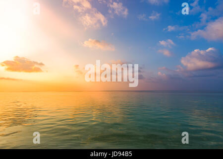 Vacation holidays background wallpaper, two beach lounge chairs under tent on beach. Tropical Holiday Banner Stock Photo