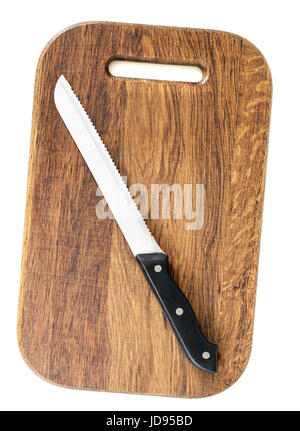 Oak wooden cutting board with bread knife isolated on white background Stock Photo