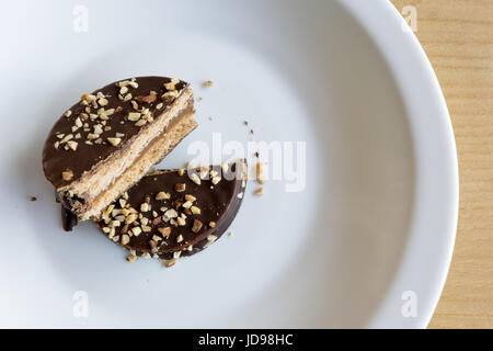 Argentina's cookie 'alfajor', chocolate coated sandwich cookie filled with caramel and almond Stock Photo