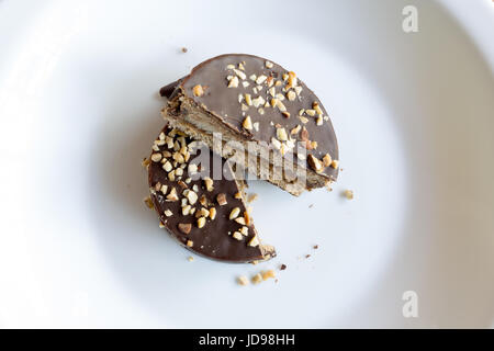 Argentina's cookie 'alfajor', chocolate coated sandwich cookie filled with caramel and almond Stock Photo