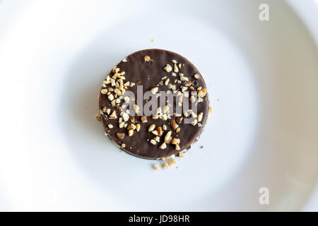 Argentina's cookie 'alfajor', chocolate coated sandwich cookie filled with caramel and almond Stock Photo