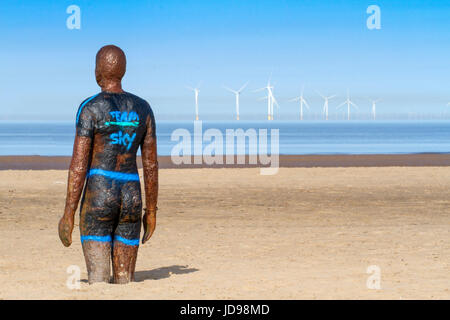 Another Place is a piece of modern sculpture by Sir Antony Gormley. It consists of 100 cast iron figures facing towards the sea. The figures are model Stock Photo