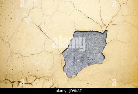Grungy wall with broken stucco frame texture Stock Photo