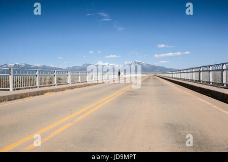 People walking on the Rio Grande Gorge Bridge in New Mexico, United States Stock Photo