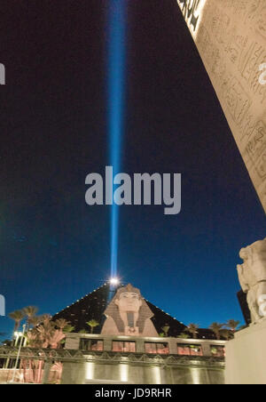 Luxor attraction with sphinx and pyramid, blue laser beam in sky, Las Vegas, Nevada, USA. Stock Photo