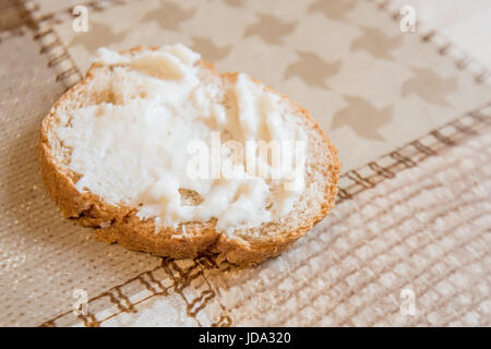 Appetizer made from horseradish, sour cream and mayonnaise on a slice of bread Stock Photo