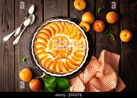 Apricot cake or pie with fresh fruits, cheesecake Stock Photo