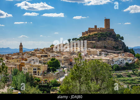 Top of the hill with Biar castle and town at dusk in Alicante, Spain Stock Photo