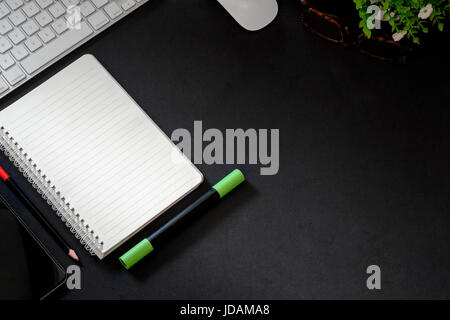 Office leather desk table with computer, supplies and notebook. Top view with copy space Stock Photo