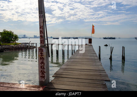 View of Penang Harbour from the boardwalk of Lee Jetty, one of the six Chinese Clan Jetties of Penang, George Town, Pulau Pinang, Malaysia. Stock Photo