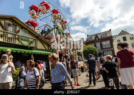 KORNELIMUENSTER, GERMANY, 18th June, 2017 - People browse the historic fair of Kornelimuenster on a sunny warm day. The fair is held annually. Stock Photo