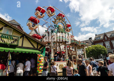 KORNELIMUENSTER, GERMANY, 18th June, 2017 - People browse the historic fair of Kornelimuenster on a sunny warm day. The fair is held annually. Stock Photo