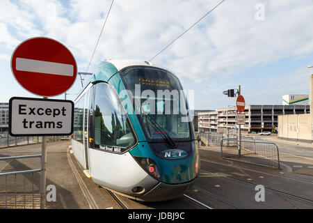 No entry except trams road sign with tram approaching Nottingham City ...