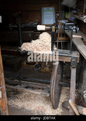 Wood turning at the Latvian Ethnographic Open-Air Museum, Lake Jugla, Riga, Latvia. Stock Photo