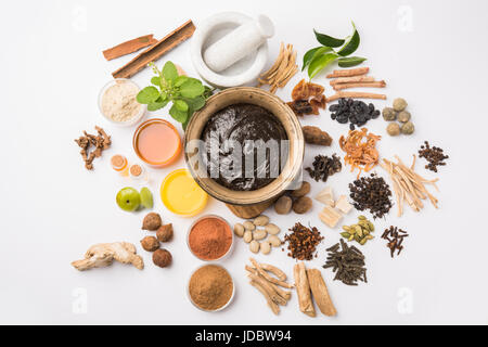 Indian Ayurvedic dietary supplement called Chyawanprash / chyavanaprasha is a cooked mixture of sugar, honey, ghee, Indian Gooseberry (amla), jam, ses Stock Photo