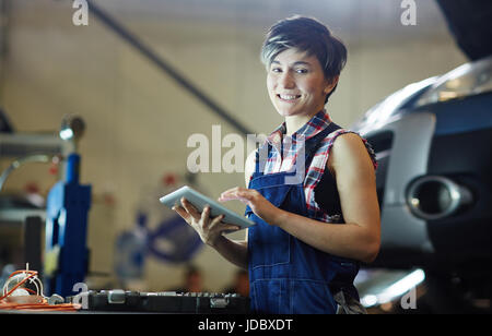 Networking in garage Stock Photo