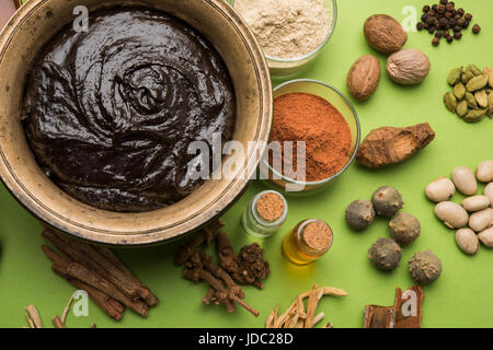 Indian Ayurvedic dietary supplement called Chyawanprash / chyavanaprasha is a cooked mixture of sugar, honey, ghee, Indian Gooseberry (amla), jam, ses Stock Photo