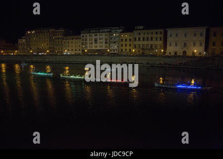 Traditional San Ranieri Regatta in Pisa. The famous Luminaria is dedicated to San Ranieri since 1688, when the grand duke of Tuscany, Cosimo de’ Medici, decided to put his body into a precious, marble tomb. At sunset, every June 16, thousands of candles previously put onto Pisa’s bridges, near doors and windows are lit up. (Photo by Lorenzo Apra / Pacific Press) Stock Photo