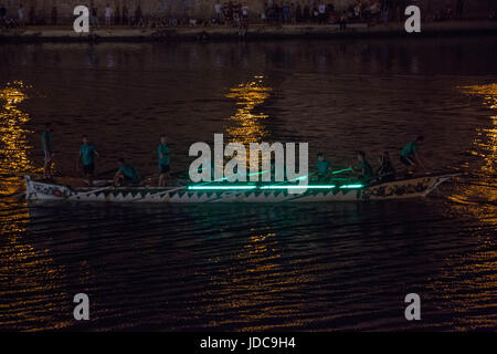 Traditional San Ranieri Regatta in Pisa. The famous Luminaria is dedicated to San Ranieri since 1688, when the grand duke of Tuscany, Cosimo de’ Medici, decided to put his body into a precious, marble tomb. At sunset, every June 16, thousands of candles previously put onto Pisa’s bridges, near doors and windows are lit up. (Photo by Lorenzo Apra / Pacific Press) Stock Photo