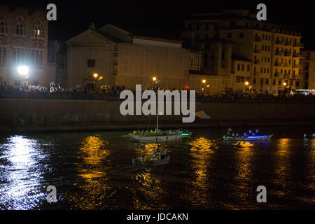 Traditional San Ranieri Regatta in Pisa. The famous Luminaria is dedicated to San Ranieri since 1688, when the grand duke of Tuscany, Cosimo de’ Medici, decided to put his body into a precious, marble tomb. At sunset, every June 16, thousands of candles previously put onto Pisa’s bridges, near doors and windows are lit up. (Photo by Lorenzo Apra / Pacific Press) Stock Photo