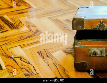 Old suitcase of emigrant Stock Photo