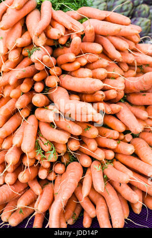 Display of fresh carrots at the farmers market Stock Photo