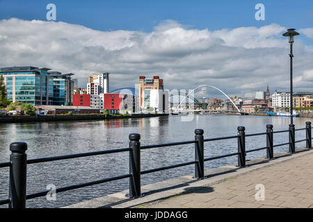 River Tyne and Gateshead Millennium Bridge (green Tyne Bridge in background), Quayside, Newcastle, Northumberland, England, United Kingdom Stock Photo