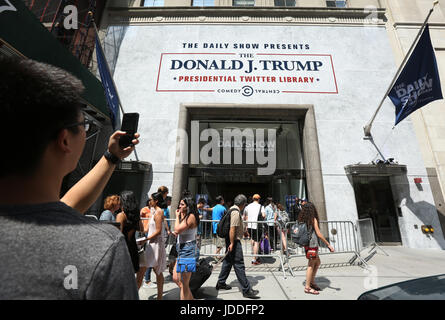 New York, USA. 18th Jun, 2017. Guests attend The Daily Show Donald J. Trump Presidential Twitter Library on West 57th Street in Manhattan during the last day of the three-day pop-up exhibit on Sunday June 18, 2017 in New York, USA. Credit: SEAN DRAKES/Alamy Live News Stock Photo