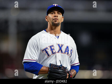 Texas Rangers starting pitcher Ross Wolf throws to the Baltimore ...