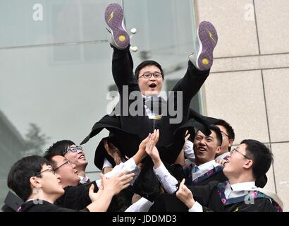 Hefei, China's Anhui Province. 20th June, 2017. Students celebrate graduation in the University of Science and Technology of China (USTC) in Hefei, capital of east China's Anhui Province, June 20, 2017. Credit: Yang Xiaoyuan/Xinhua/Alamy Live News Stock Photo