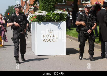 Ascot, Berkshire, UK. 20th June, 2017. Armed police officers patrol outside the grounds on Day one for Royal Ascot Credit: amer ghazzal/Alamy Live News Stock Photo