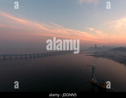 Beijing, China. 15th June, 2017. Aerial photo taken on June 15, 2017 shows the Xinghaiwan Bridge in Dalian, northeast China's Liaoning Province. Dalian is one of the host cities of the Summer Davos meeting. Credit: Li Gang/Xinhua/Alamy Live News Stock Photo