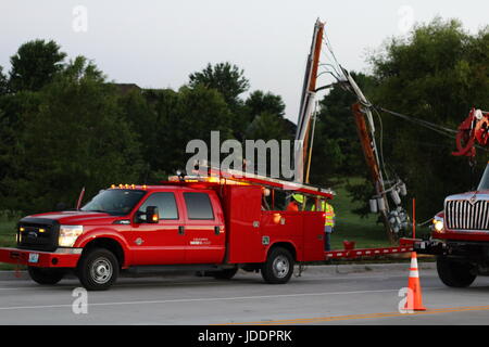 Colombia, Minnesota, USA. 20th June, 2017. Columbia Water and Light work to replace a sleeping driver's damage Credit: Redd Roberts/Alamy Live News Stock Photo