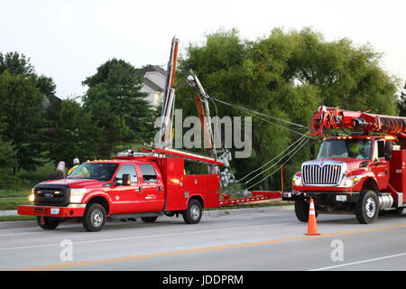 Colombia, Minnesota, USA. 20th June, 2017. Columbia Water and Light work to replace a sleeping driver's damage Credit: Redd Roberts/Alamy Live News Stock Photo