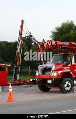 Colombia, Minnesota, USA. 20th June, 2017. Columbia Water and Light work to replace a sleeping driver's damage Credit: Redd Roberts/Alamy Live News Stock Photo