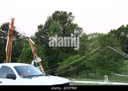 Colombia, Minnesota, USA. 20th June, 2017. Columbia Water and Light work to replace a sleeping driver's damage Credit: Redd Roberts/Alamy Live News Stock Photo