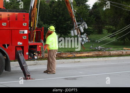 Colombia, Minnesota, USA. 20th June, 2017. Columbia Water and Light work to replace a sleeping driver's damage Credit: Redd Roberts/Alamy Live News Stock Photo